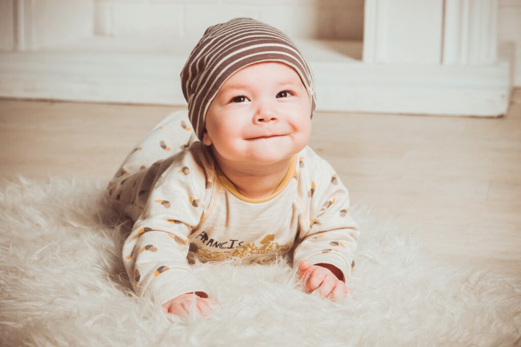 image showing a cute toddler on a floor